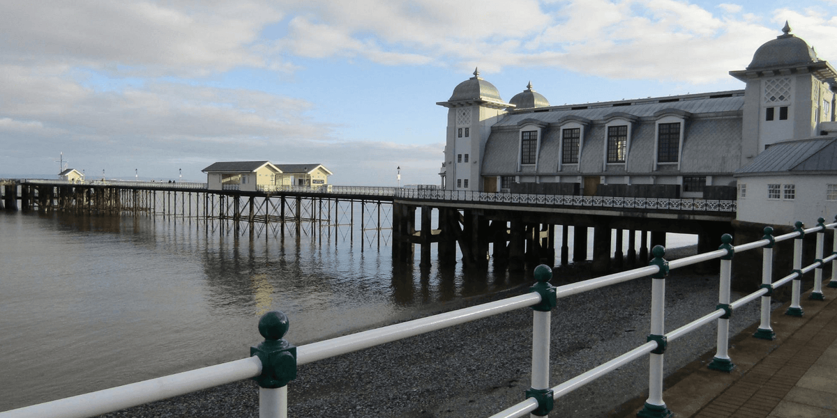 360 photo booth hire in Penarth - desktop banner showing rotating booth platform